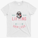 He Sees You When YouRe Lifting Skip Legs Santa Christmas T-Shirt - White
